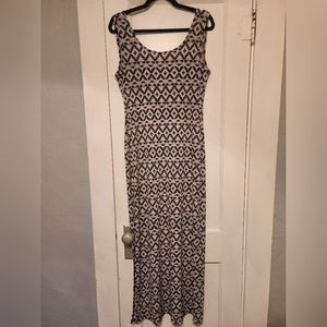 Long, Form-fitting Dress with Low Back and Side Slit